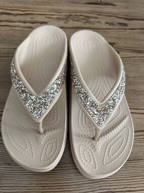 Crocs Tan Glitter Flip Flops